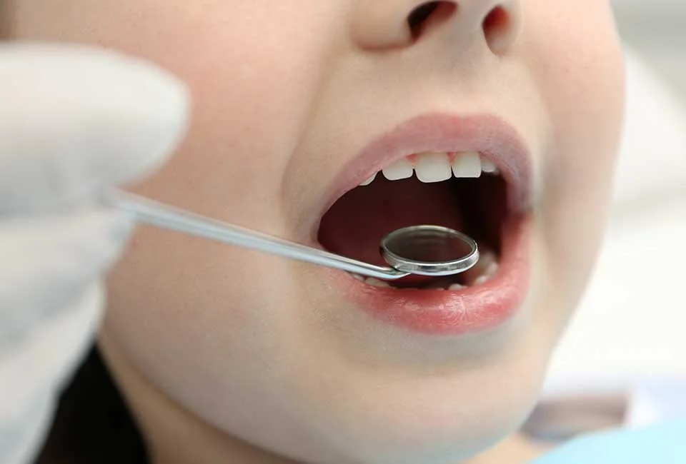 Kid getting dental check