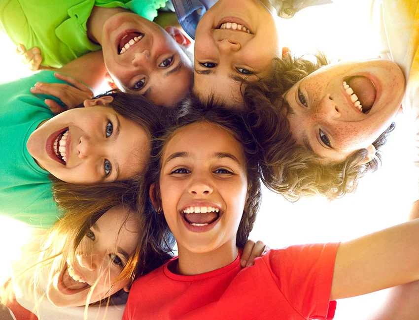 Happy kids smiling with great healthy teeth