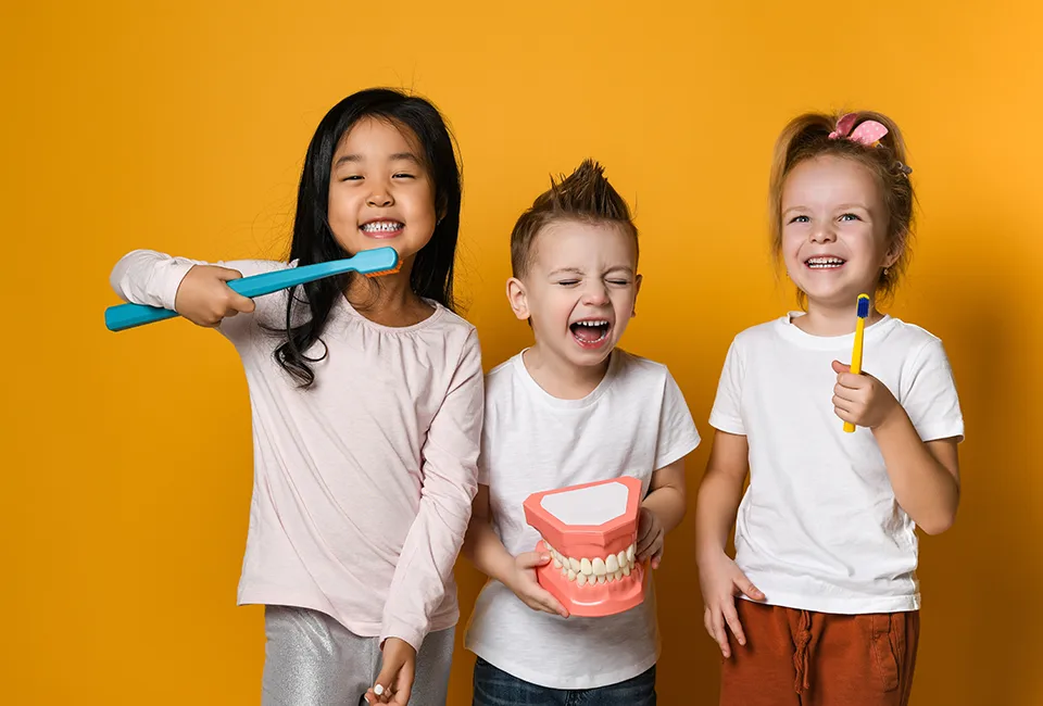 Kids having fun learning about oral health in Carlsbad, CA